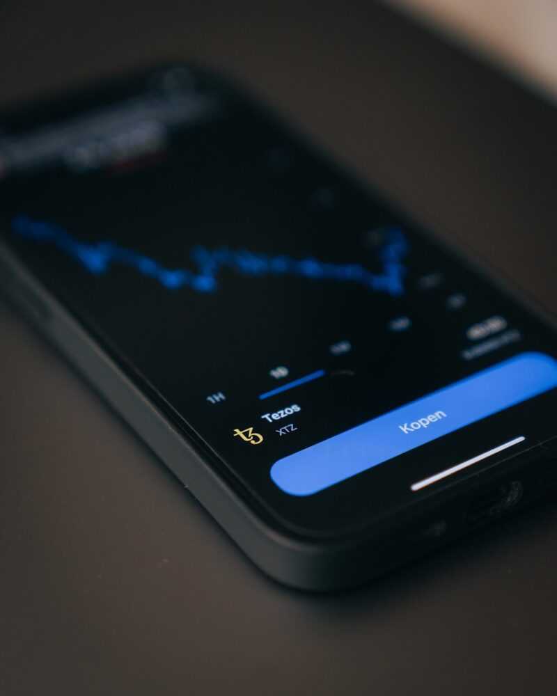 a close up of a cell phone on a table