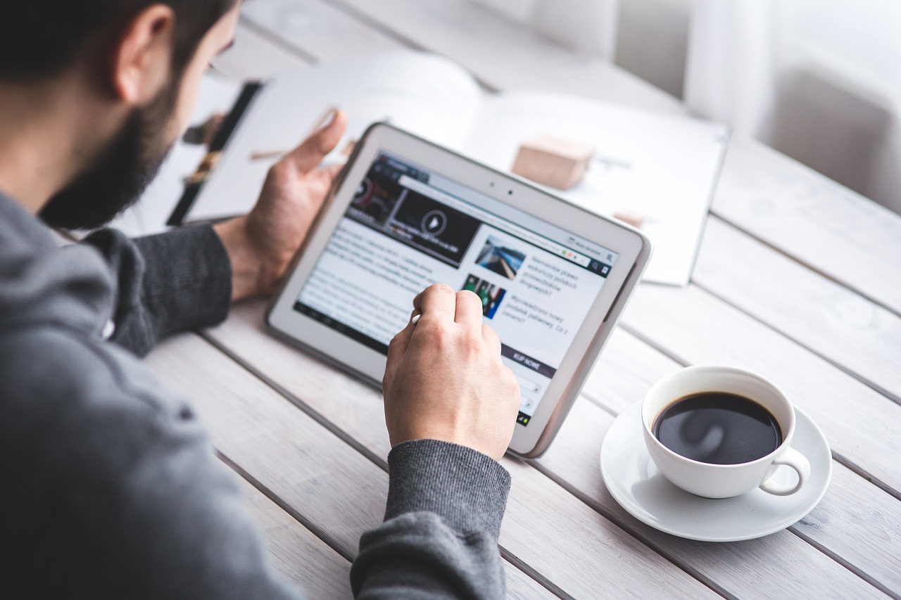man, coffee cup, reading